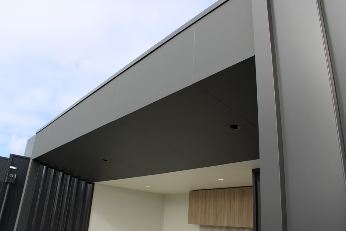 James Hardie Matrix fascia and soffit panels forming a clean entrance return